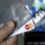 As U.S. credit card debt hits record high, lawmakers seek to cap loan rates